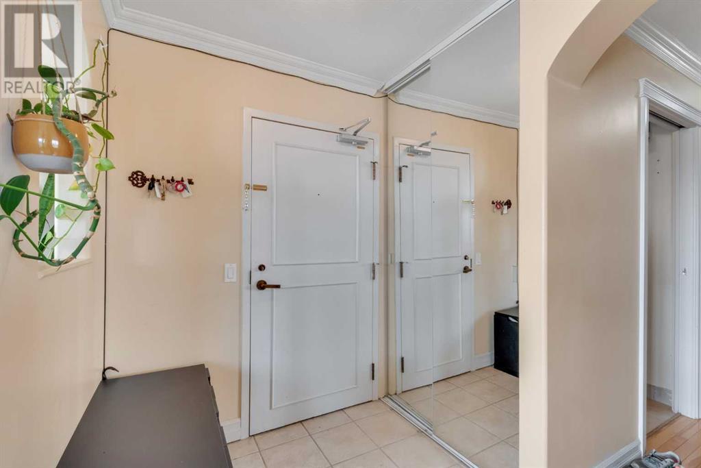 407, 145 Point Drive NW