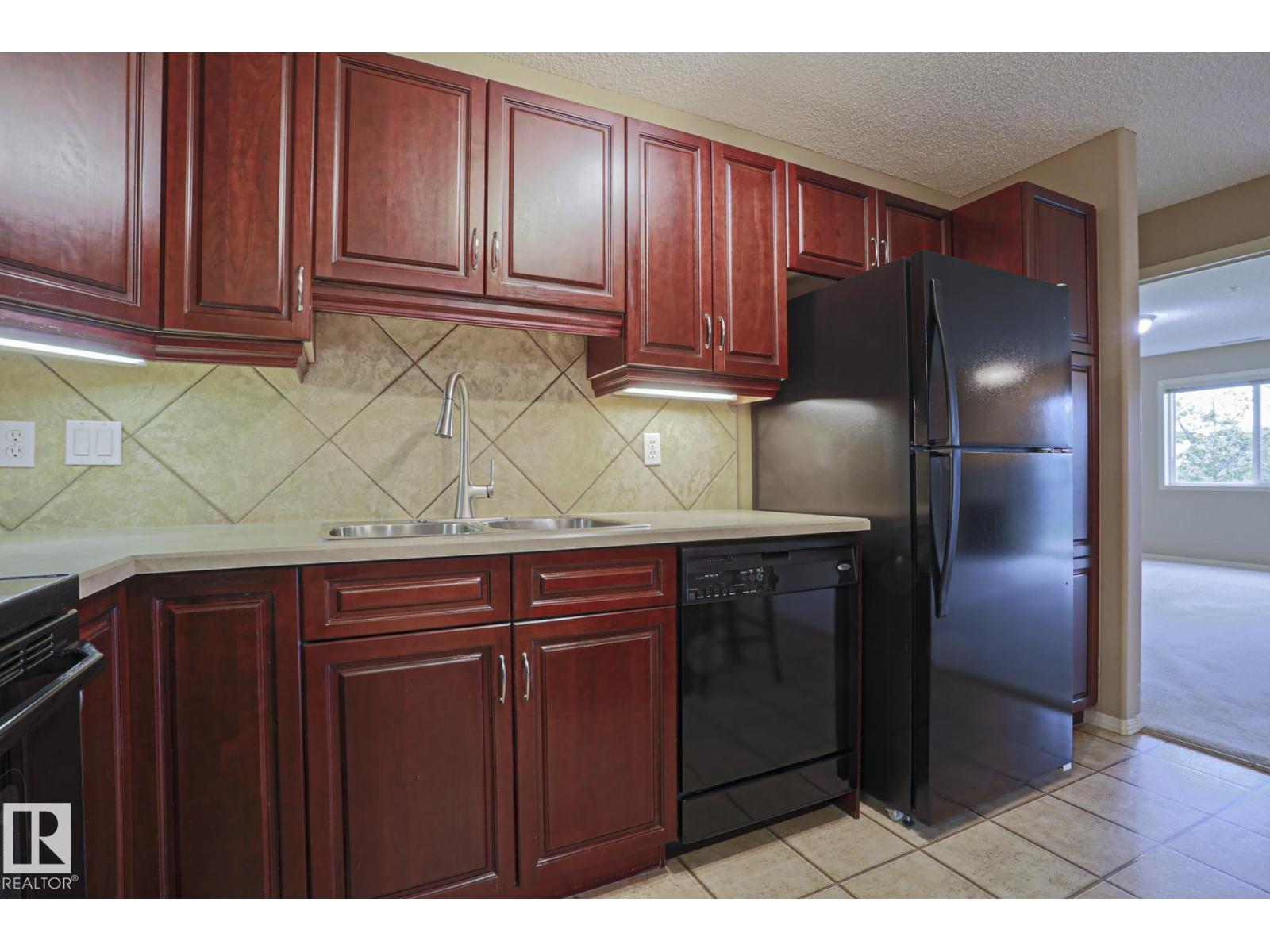 #216 279 SUDER GREENS DR NW
