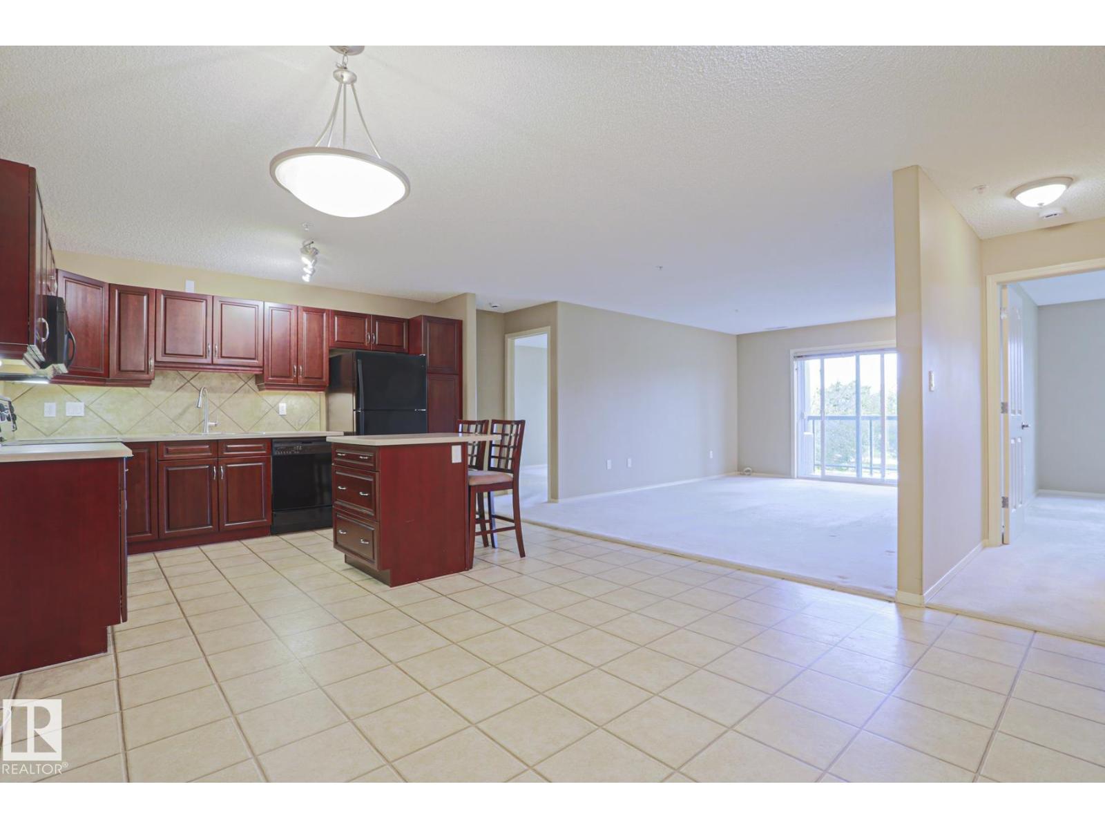 #216 279 SUDER GREENS DR NW