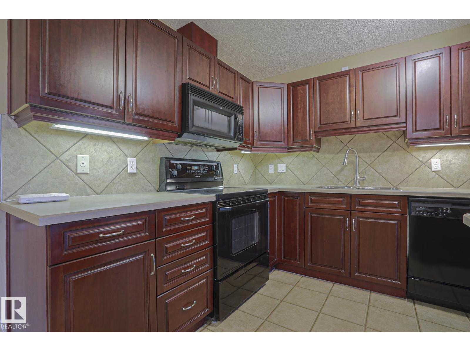 #216 279 SUDER GREENS DR NW