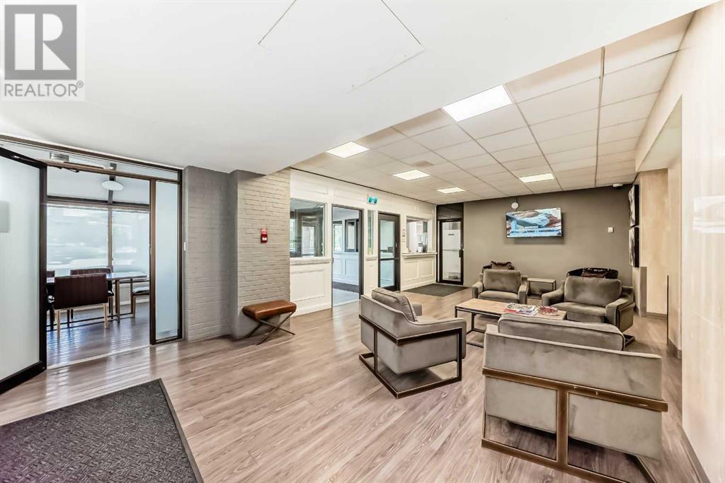 305, 145 Point Drive NW