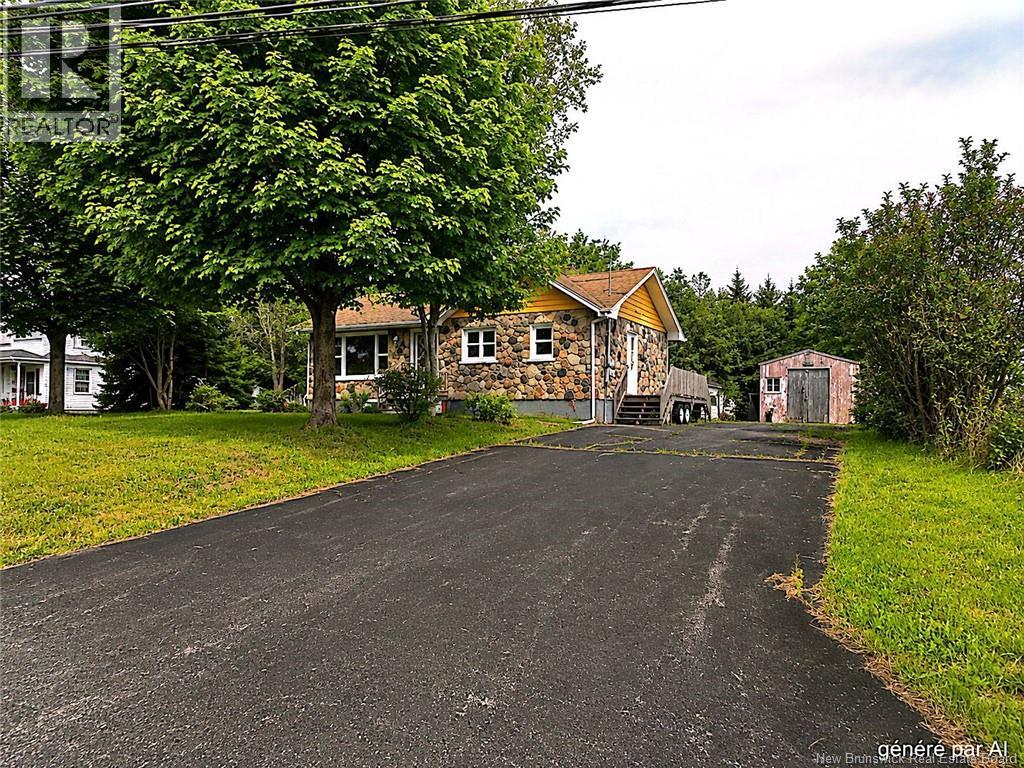 Photo 1 of 32 — 3865 Blvd des Fondateurs, Saint-Isidore, NB E8M1B7