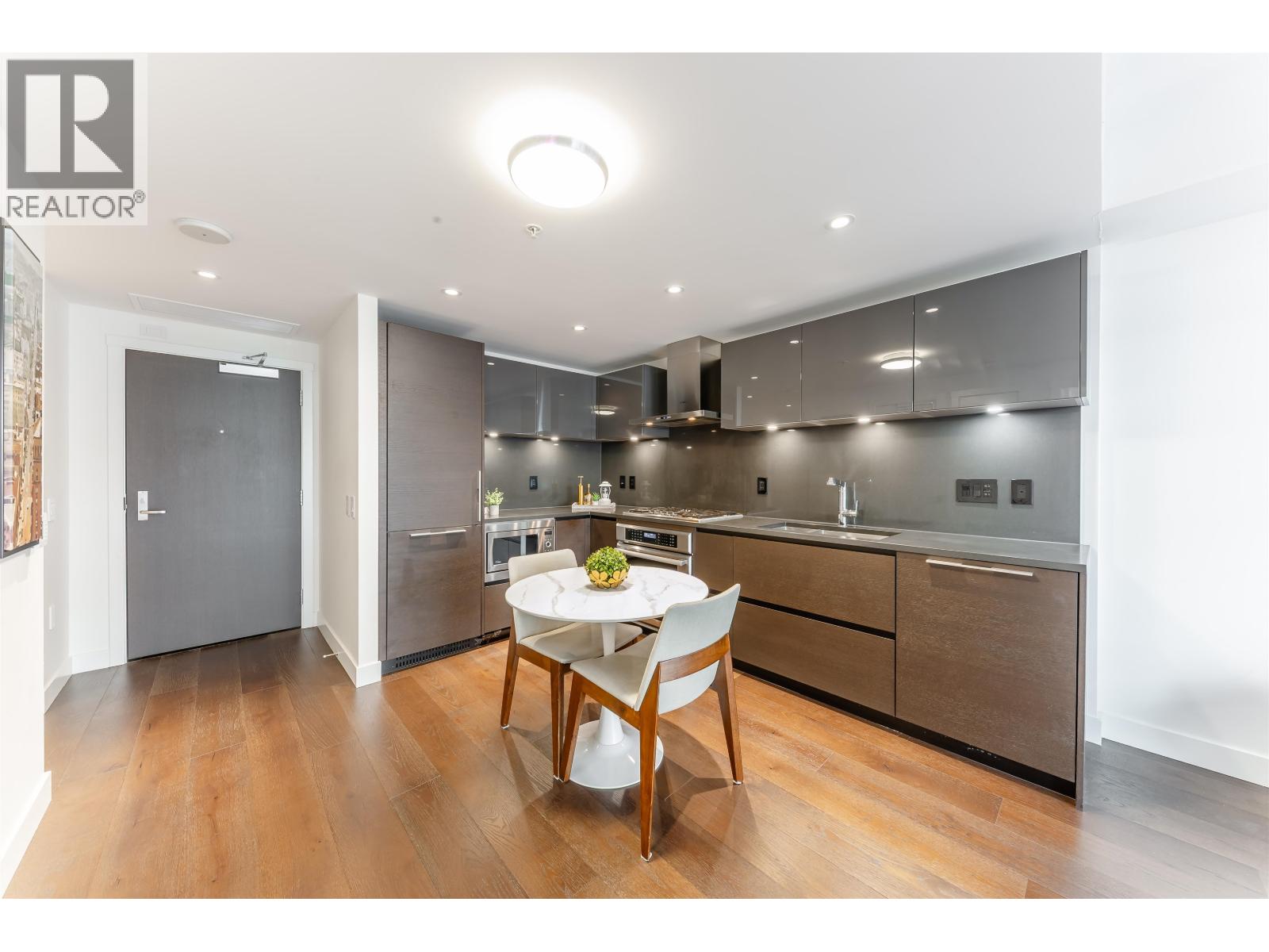 201 1561 W 57TH AVENUE