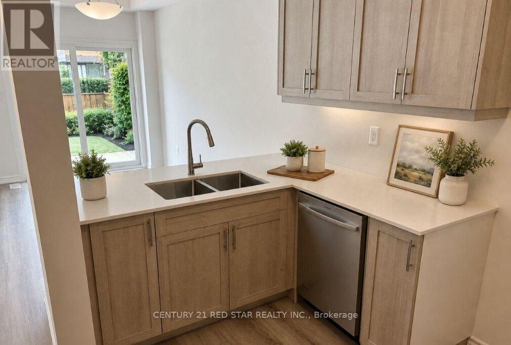 102 - 461 BLACKBURN DRIVE
