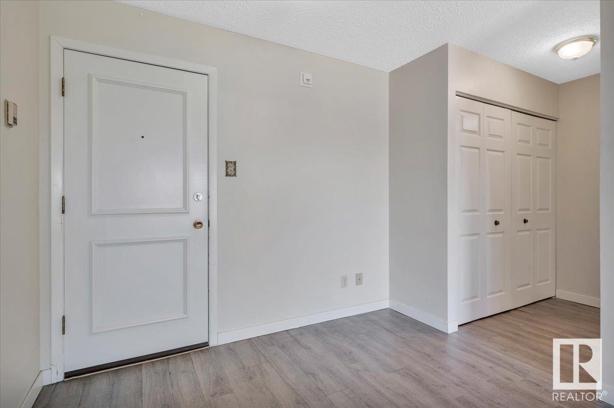 #211 5520 RIVERBEND RD NW