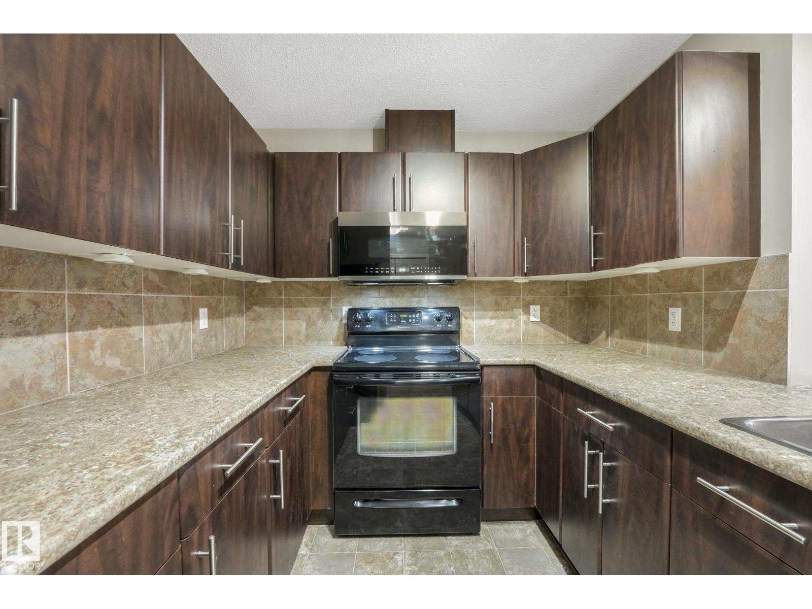 #210 103 AMBLESIDE DR SW