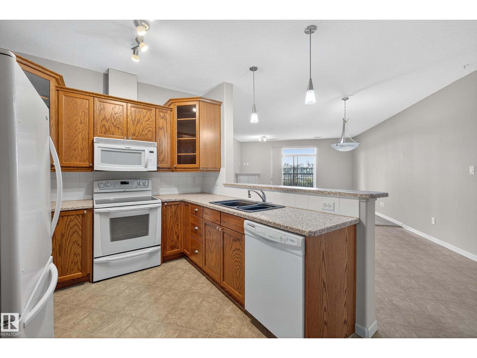 #112 2503 HANNA CR NW