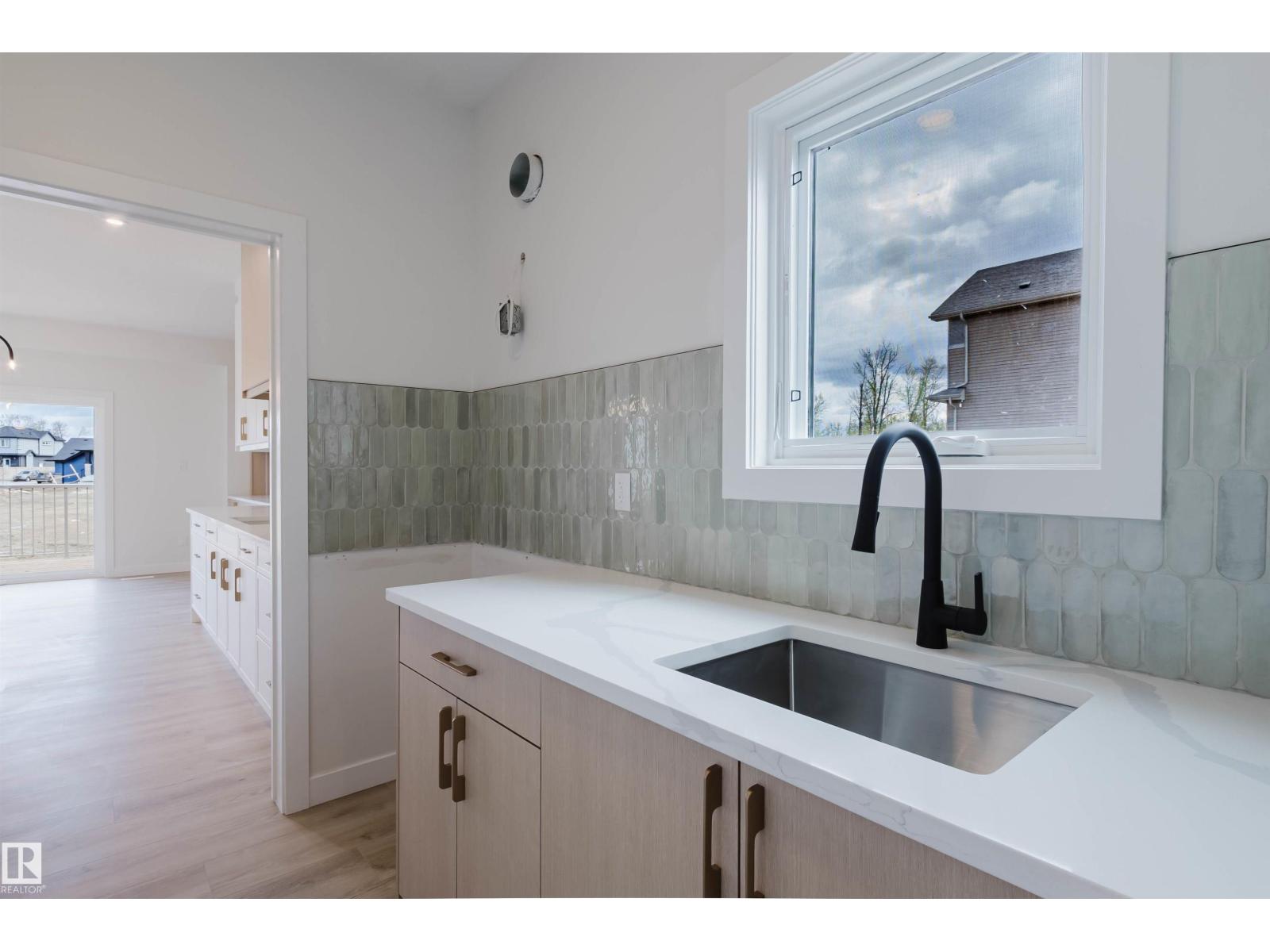 703 ELDERBERRY CL NW