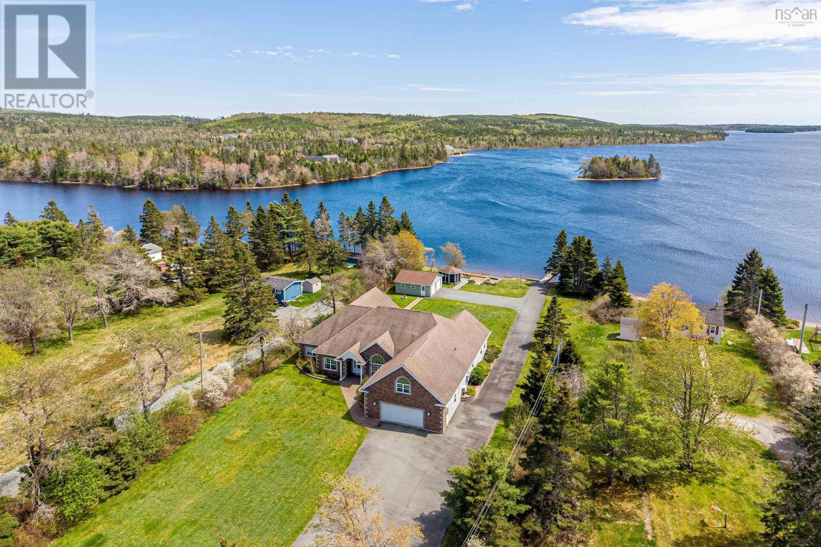 Photo 1 of 44 — 262 Bellefontaine Road, Middle Porters Lake, NS B3E1K7