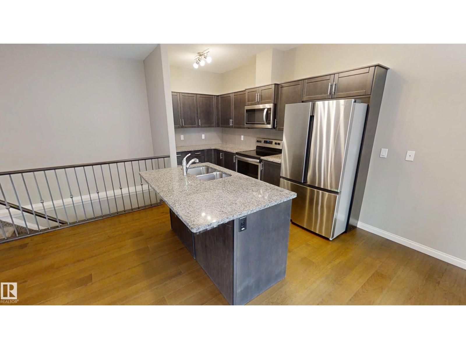 #59 18230 104A ST NW