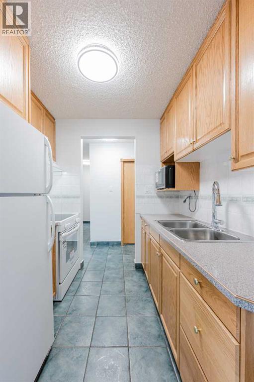 303, 635 56 Avenue SW