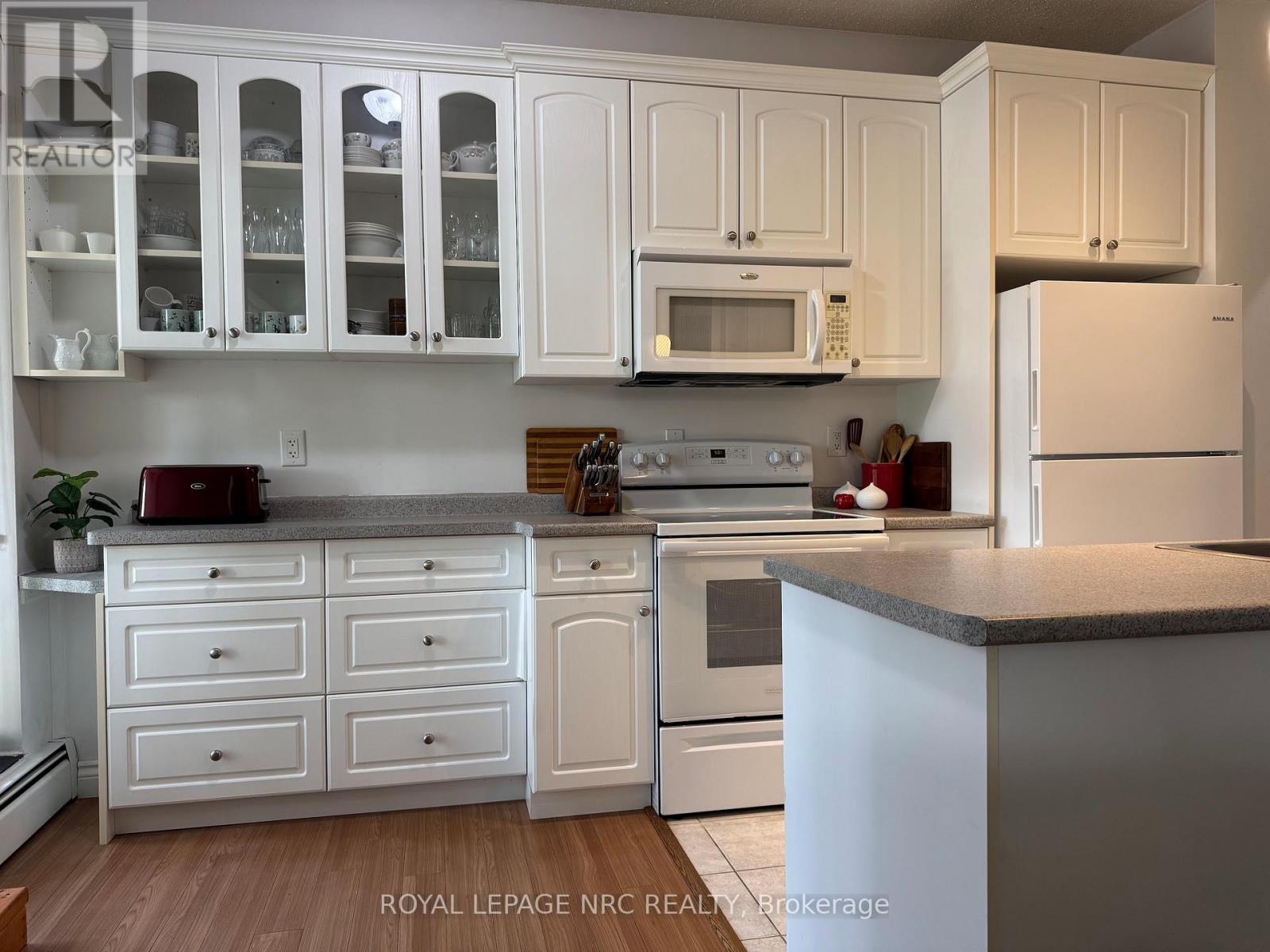 101 - 6390 HUGGINS STREET