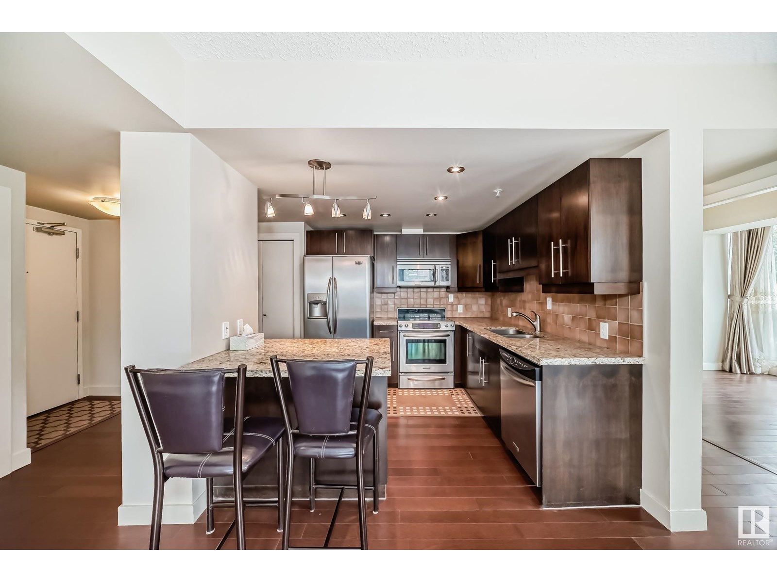 #203 10046 117 ST NW