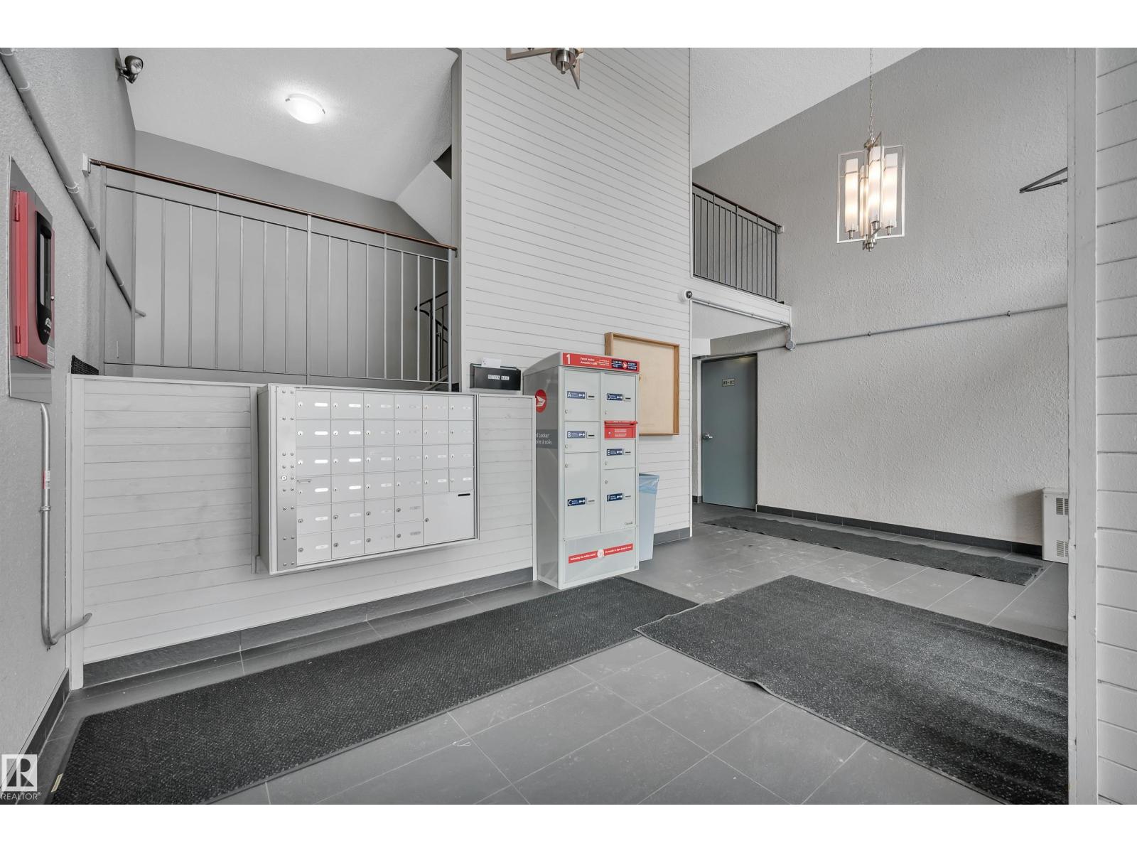 #201 237 WOODVALE RD W NW