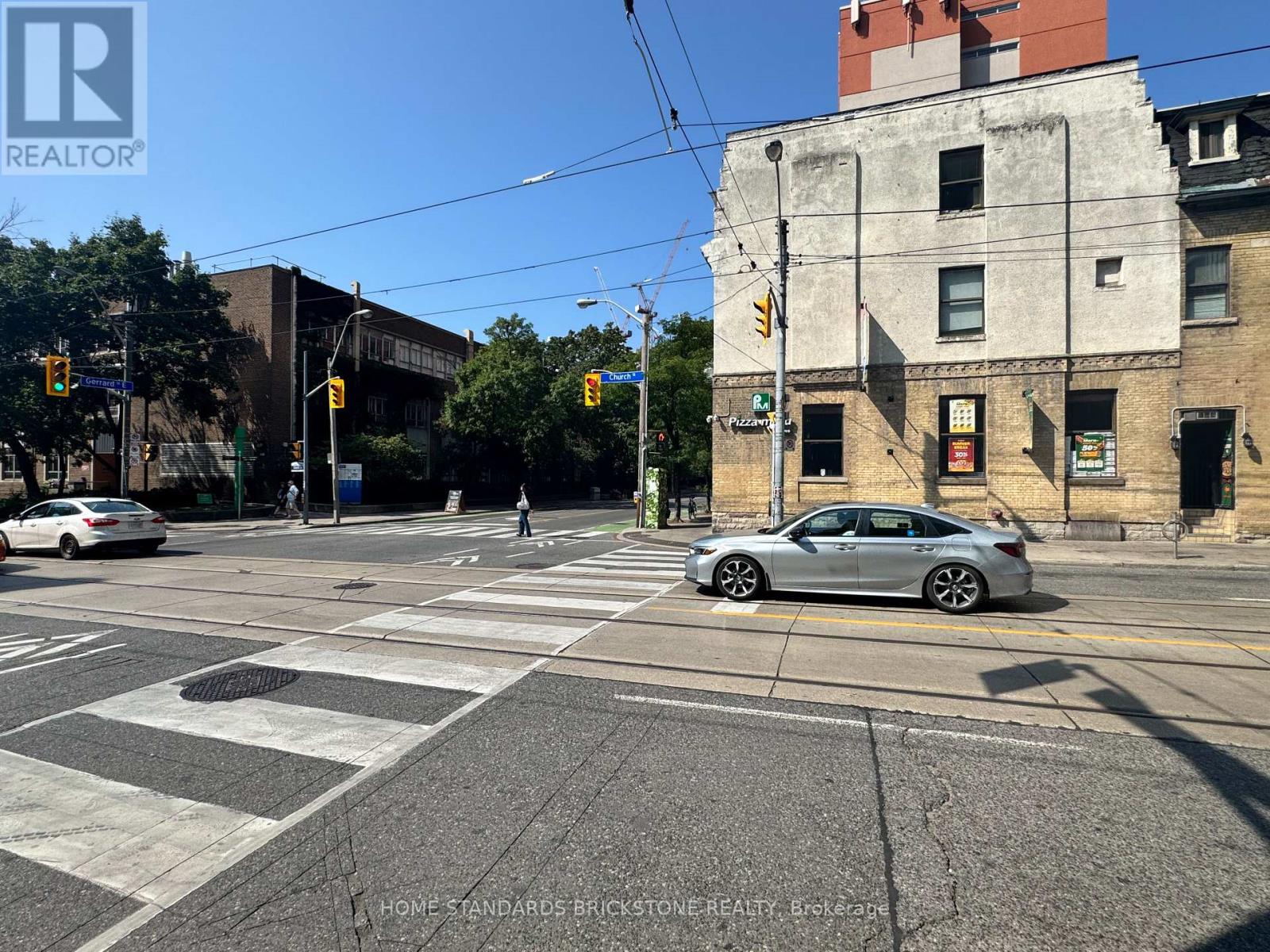 100 - 66 GERRARD STREET E