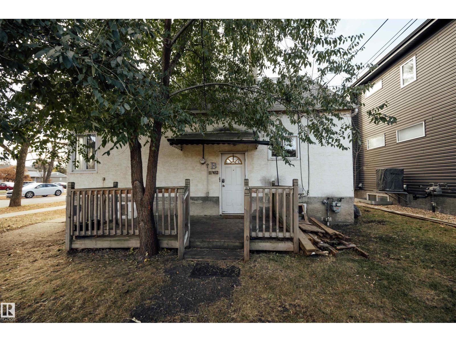 11302 75 AV NW