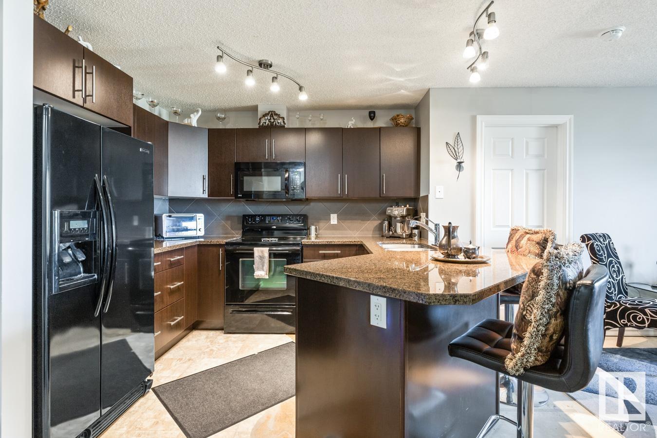 #115 2208 44 AV NW