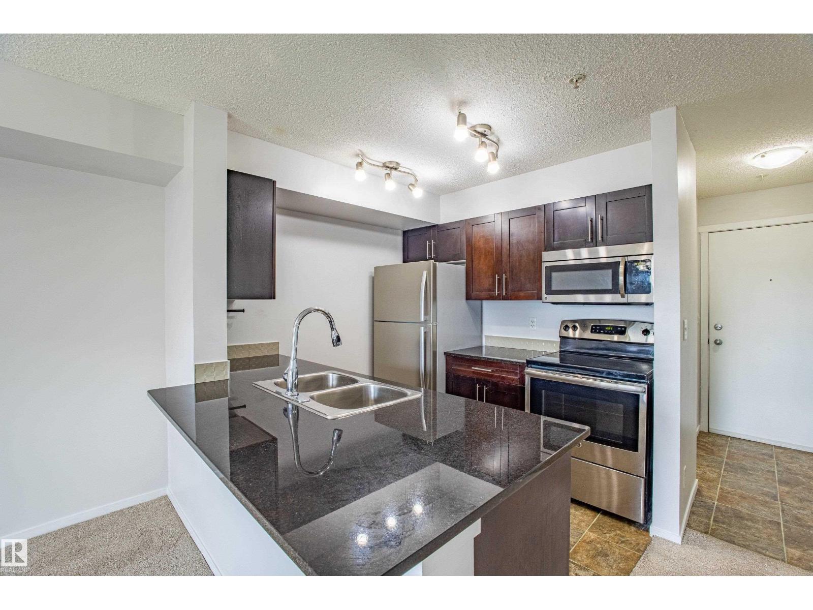 #108 5810 MULLEN PL NW