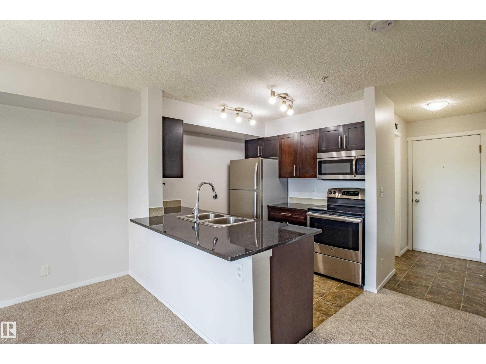 #108 5810 MULLEN PL NW