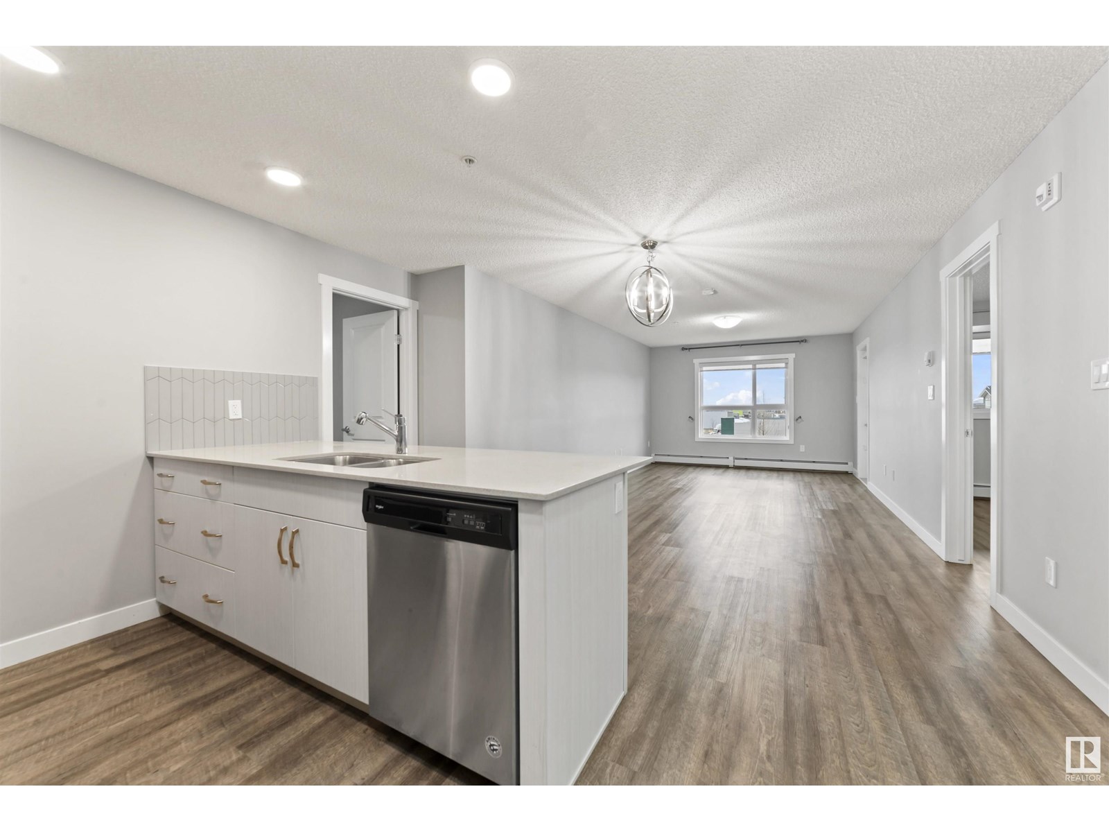 #310 1506 TAMARACK BV NW