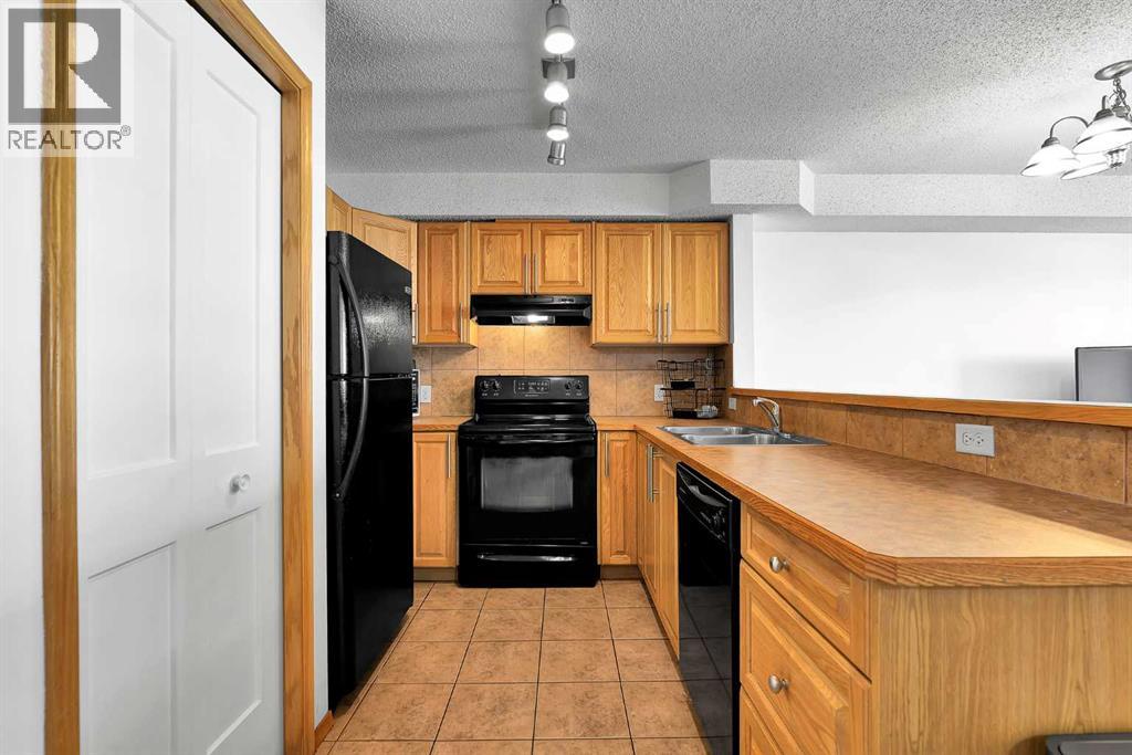 218, 92 Saddletree Court NE