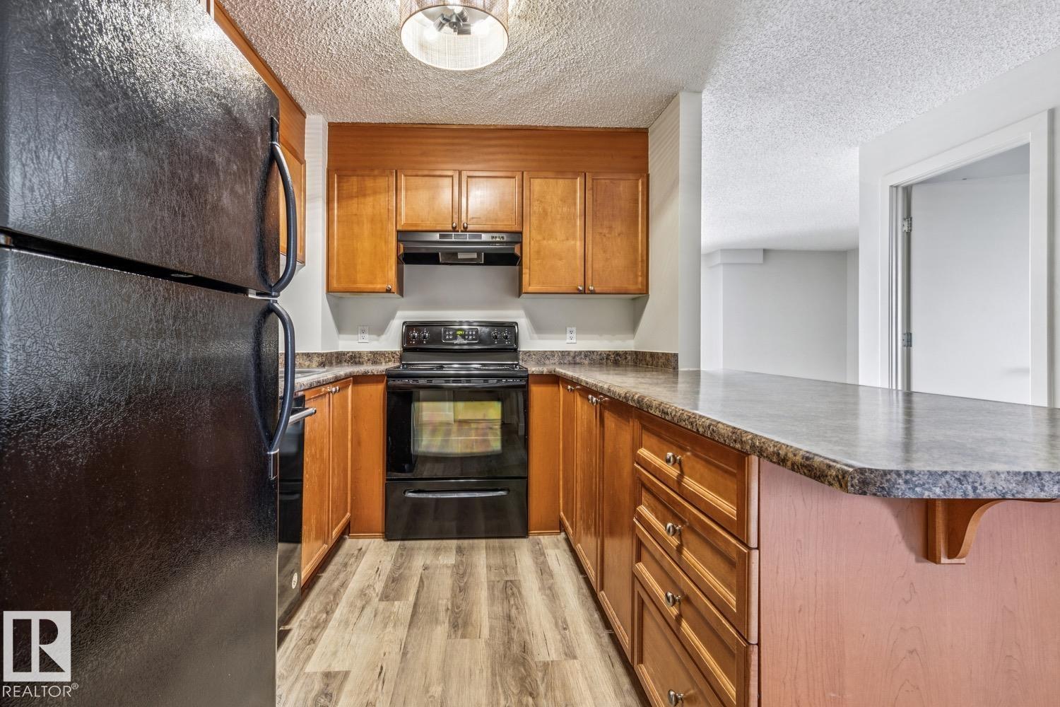 #404 9715 110 ST NW