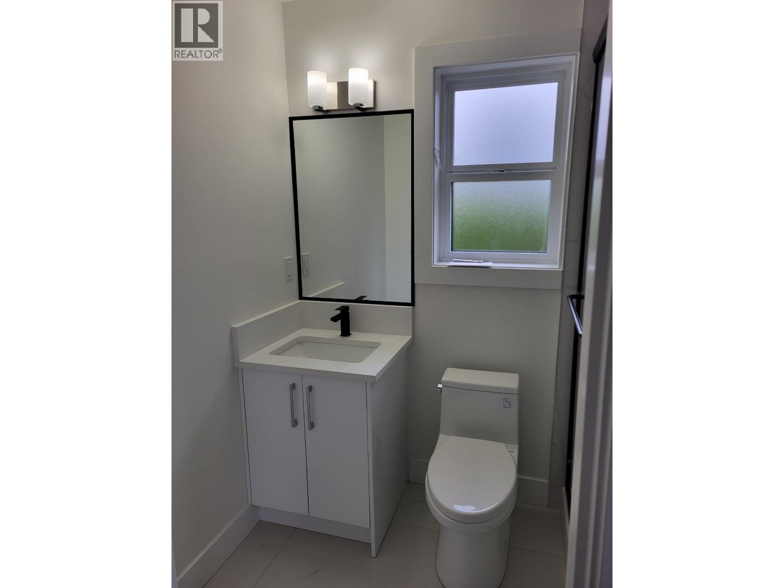 4 6765 KITCHENER STREET