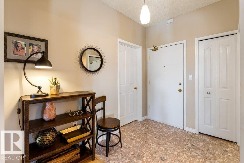 #203 15499 CASTLE DOWNS RD NW