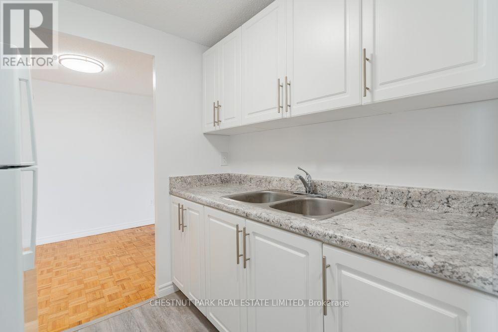 202 - 1060 CAVEN STREET