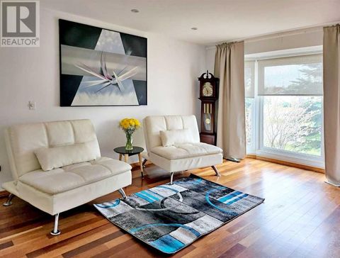 59 Woodmont Way SW Calgary AB T2W4L7