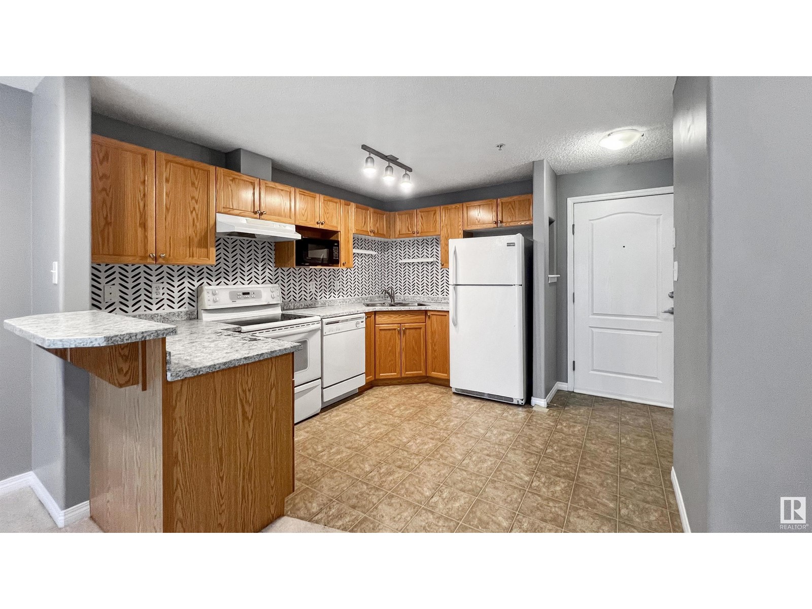 #221 155 EDWARDS DR SW