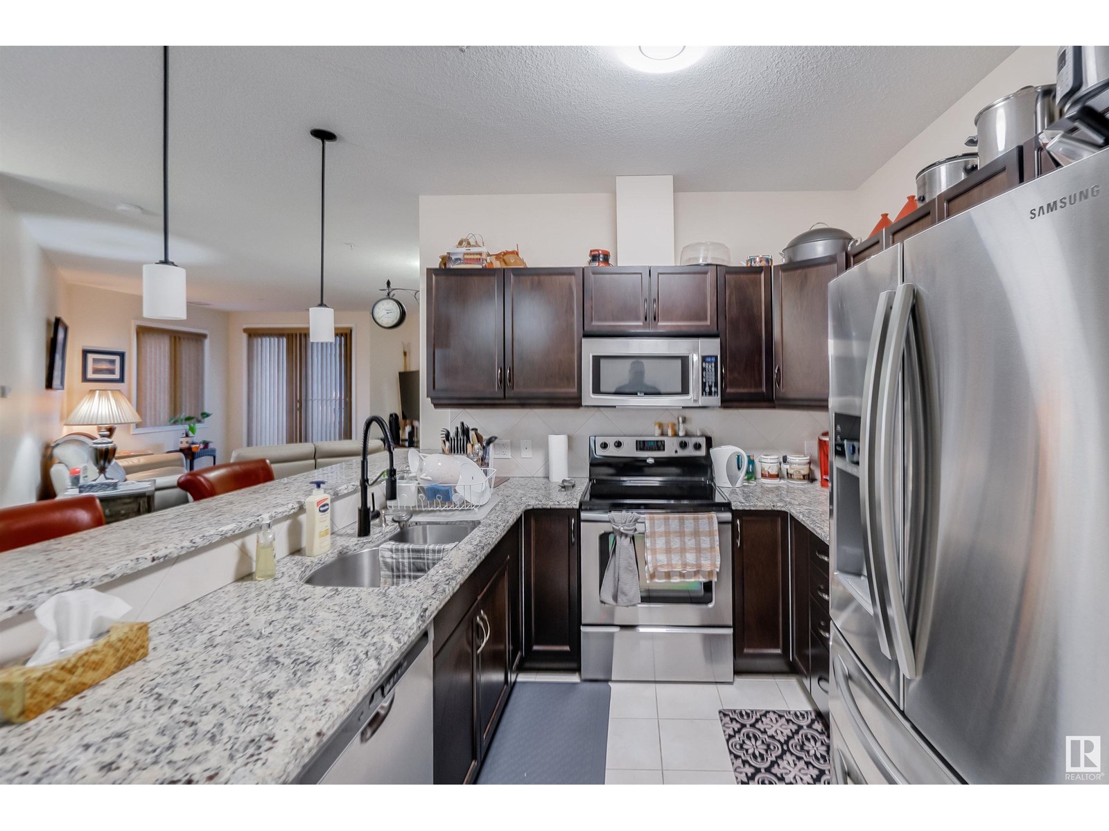 #322 6083 MAYNARD WY NW