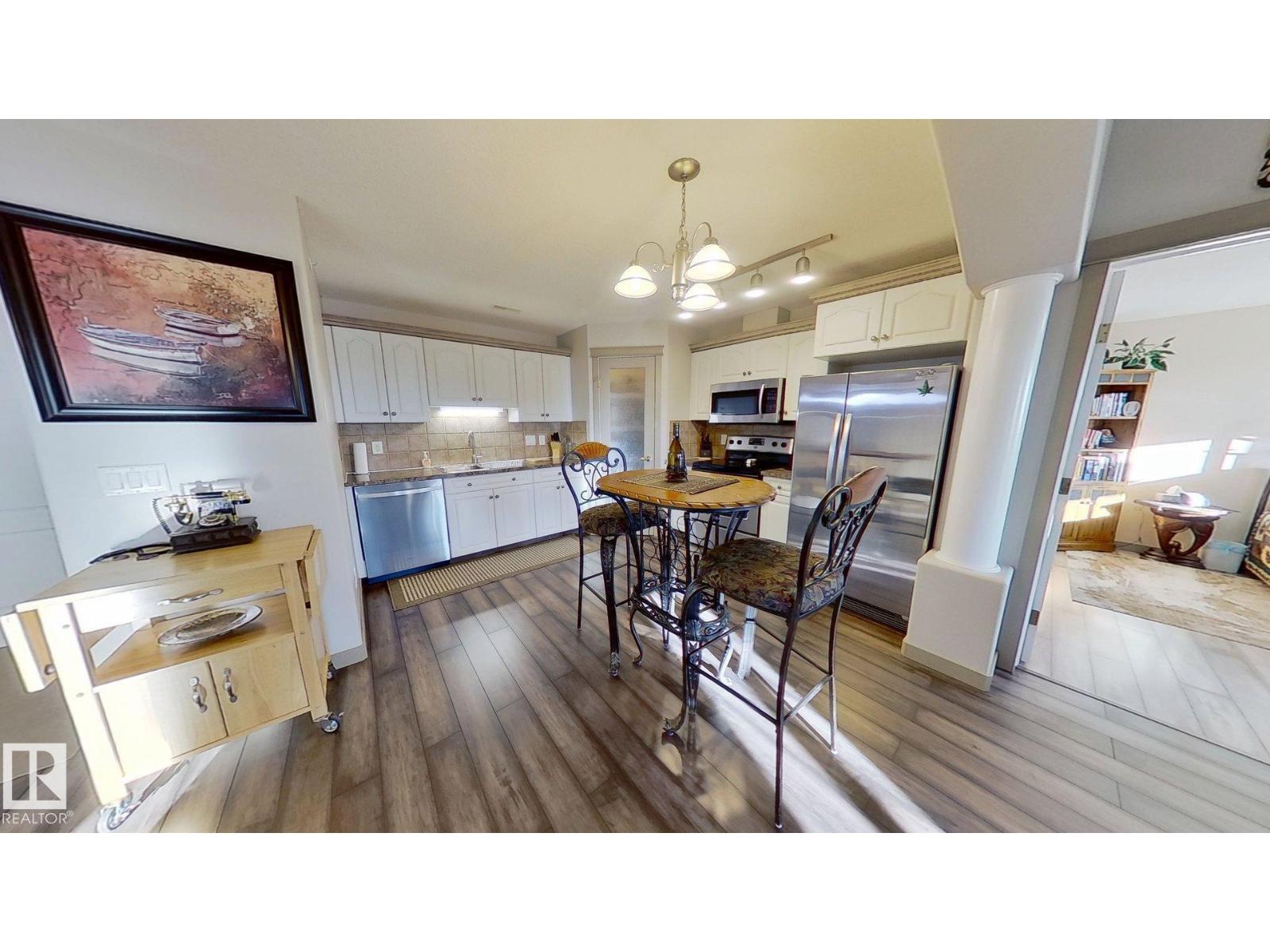 #516 237 YOUVILLE DR E NW