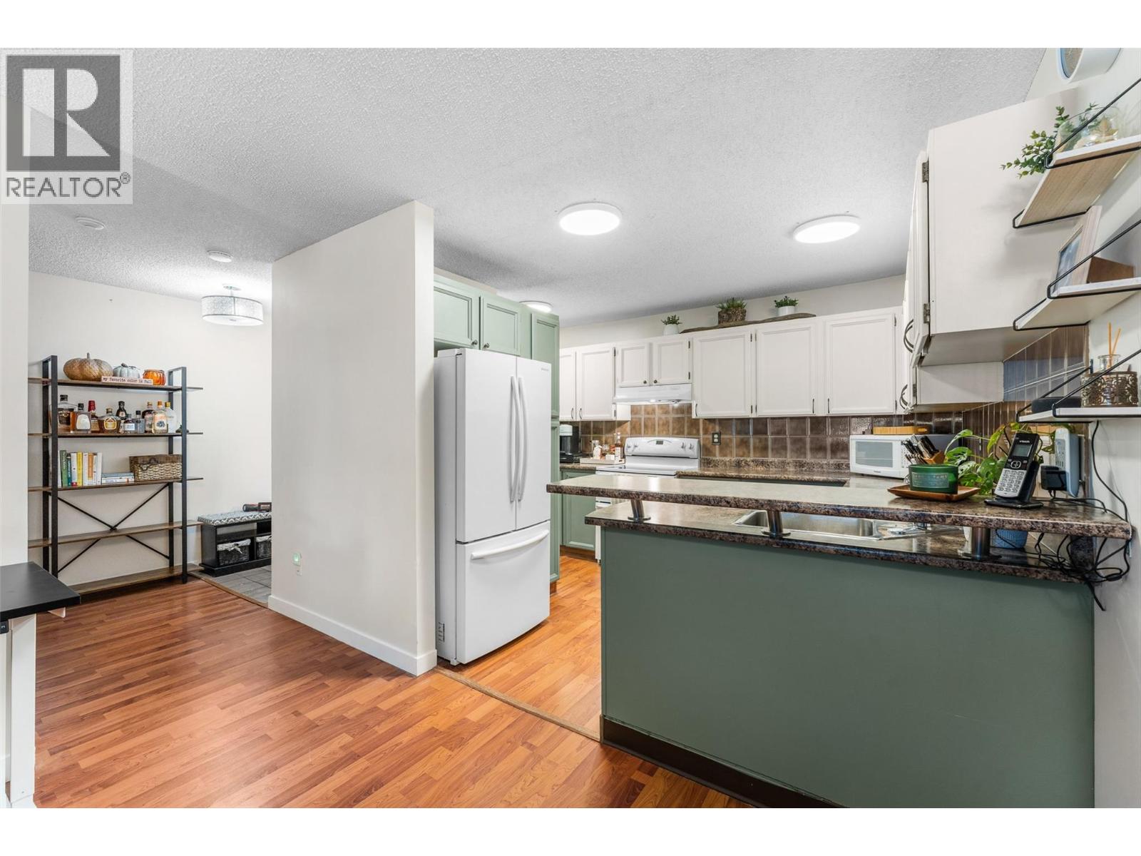 983 Bernard Avenue Unit# 210