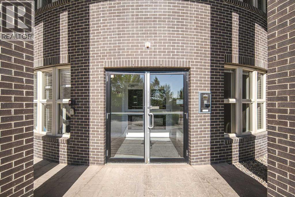 203, 88 Arbour Lake Road NW