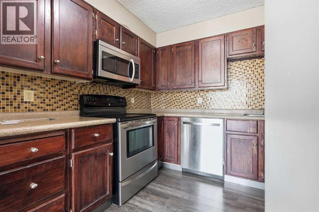 406, 145 Point Drive NW