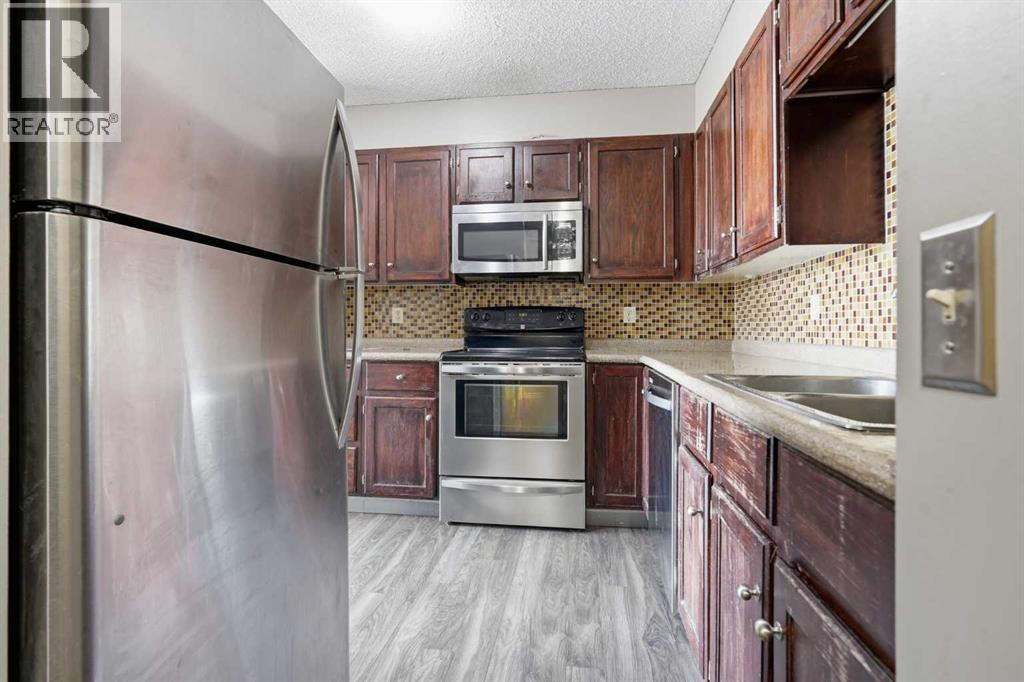 406, 145 Point Drive NW