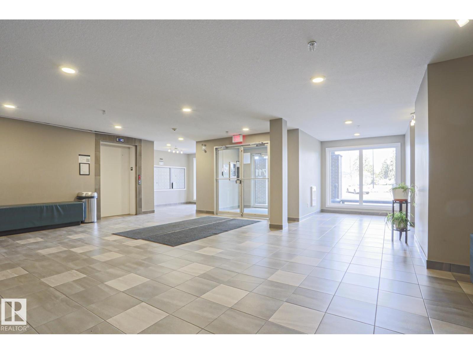 #303 7711 71 ST NW NW
