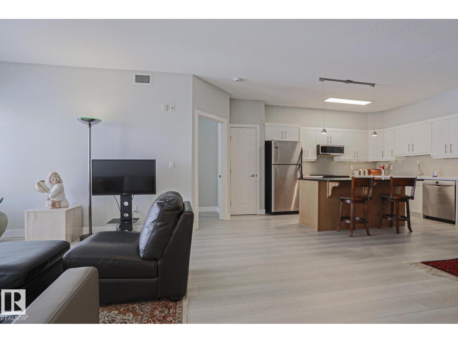 #432 1406 HODGSON WY NW