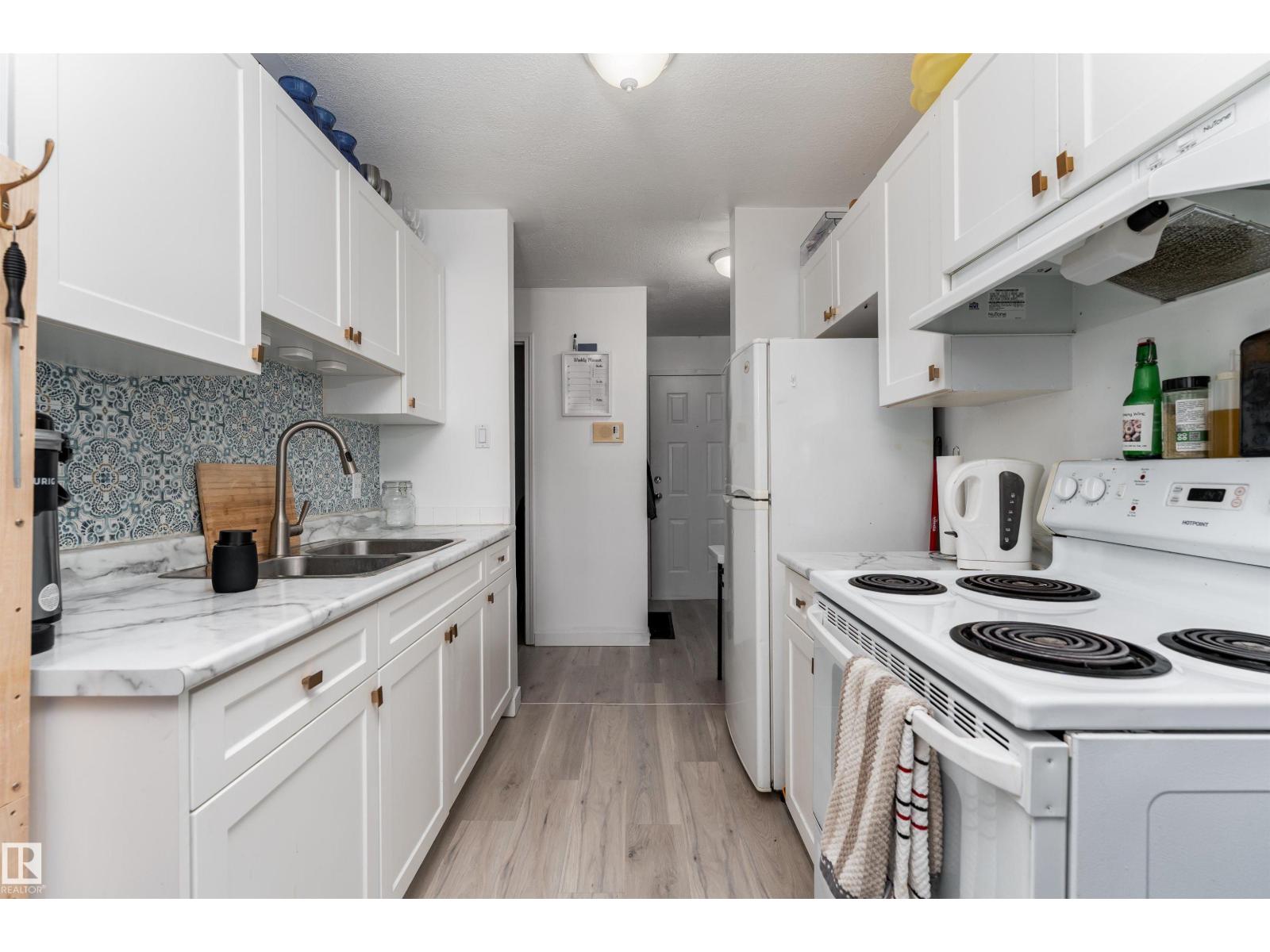 #203 8930 149 ST NW