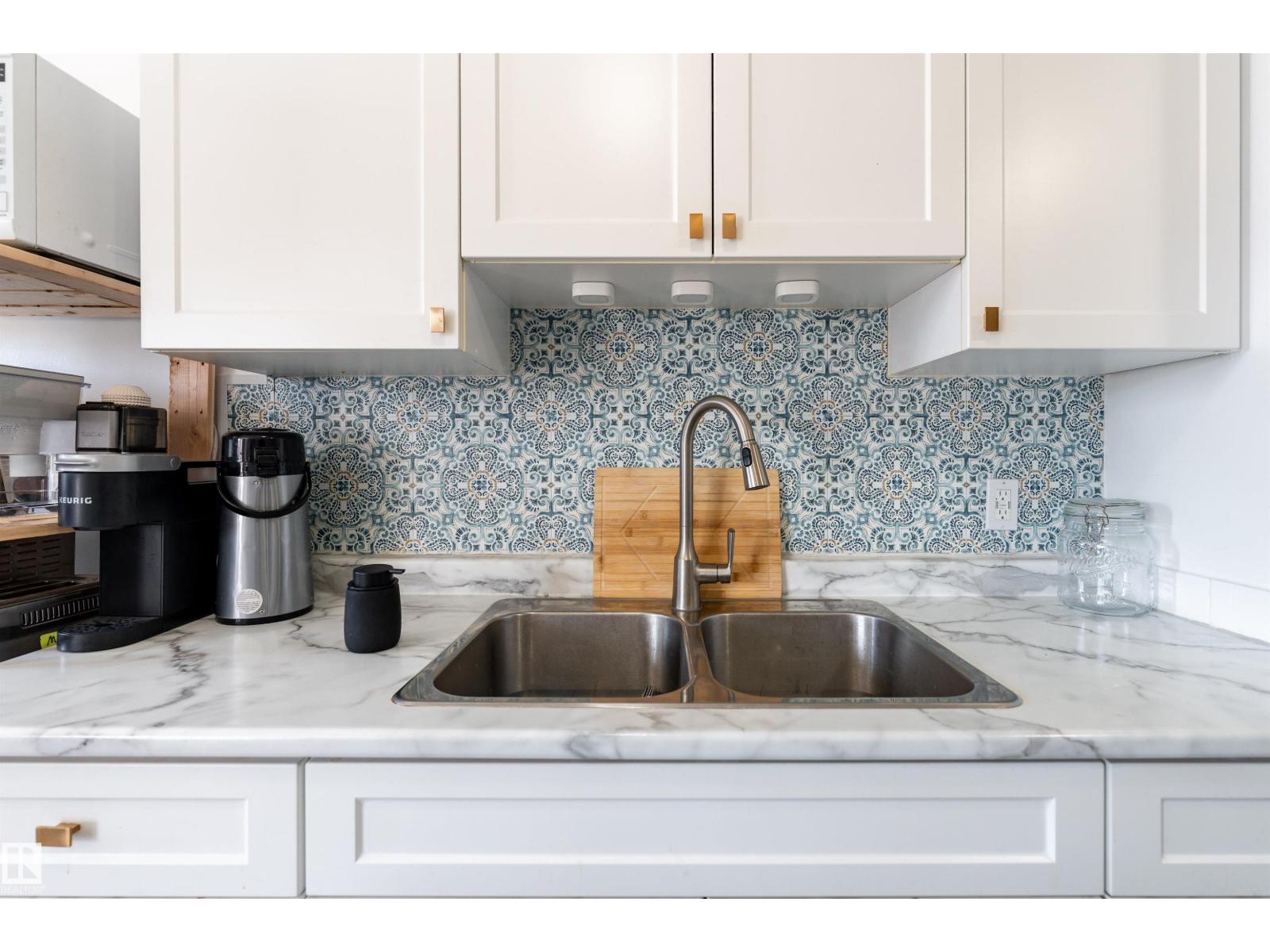 #203 8930 149 ST NW