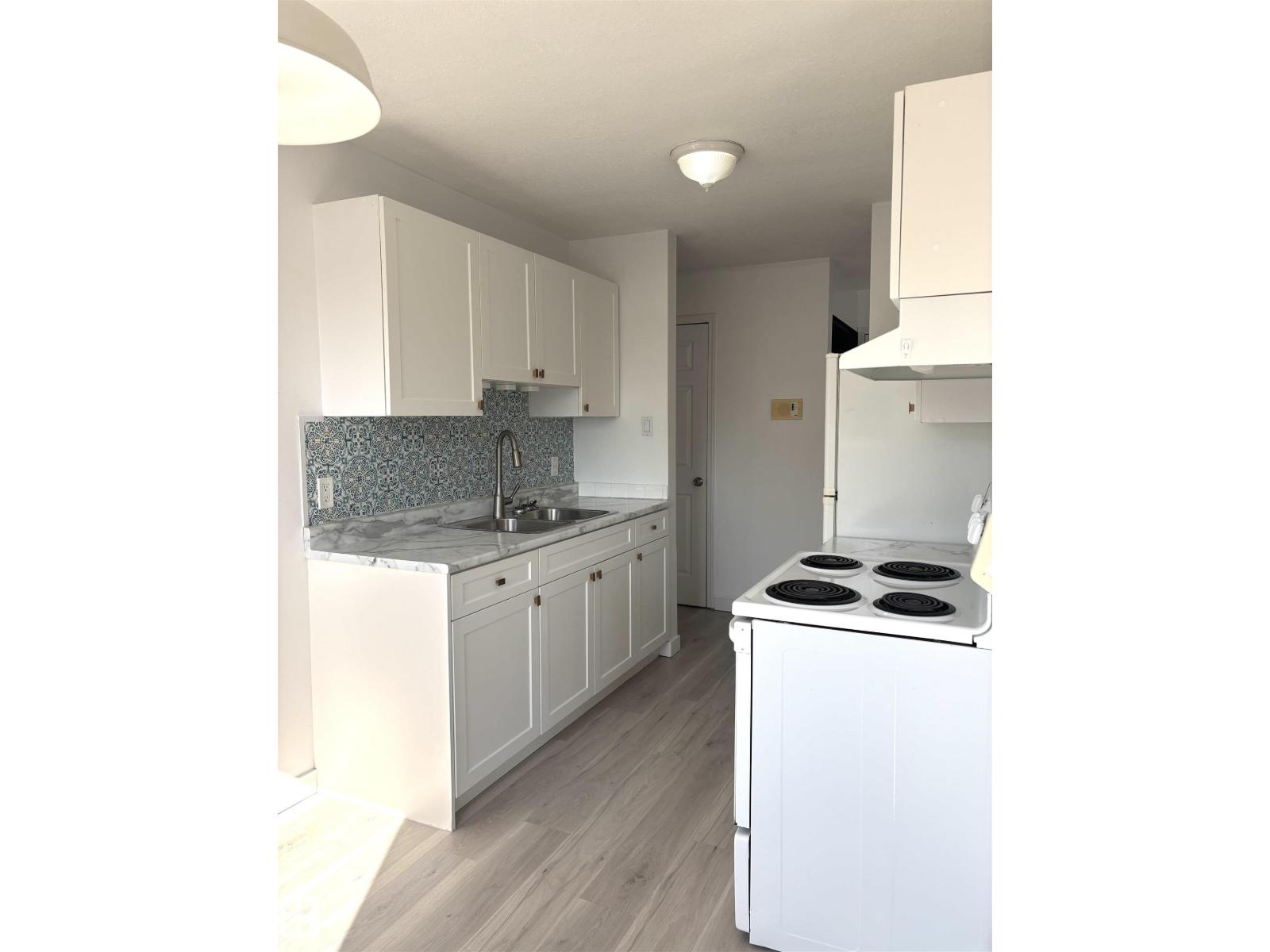 #203 8930 149 ST NW