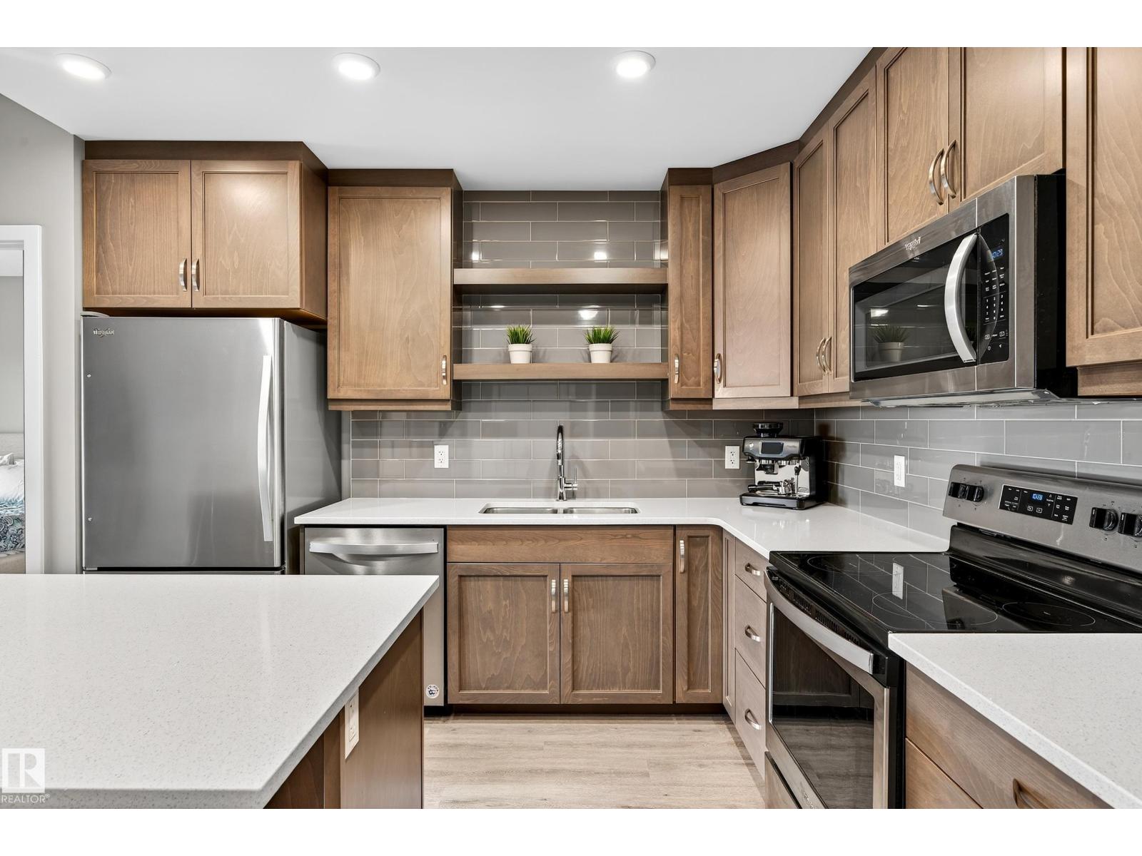 #428 5504 SCHONSEE DR NW