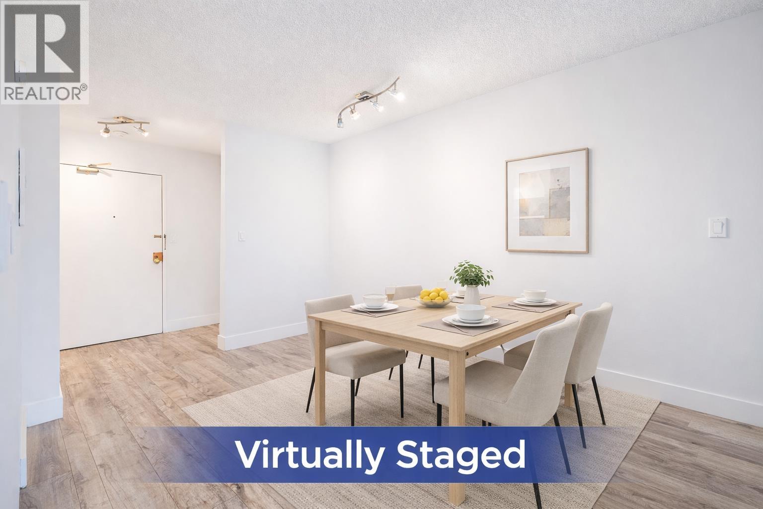 201 830 E 7TH AVENUE