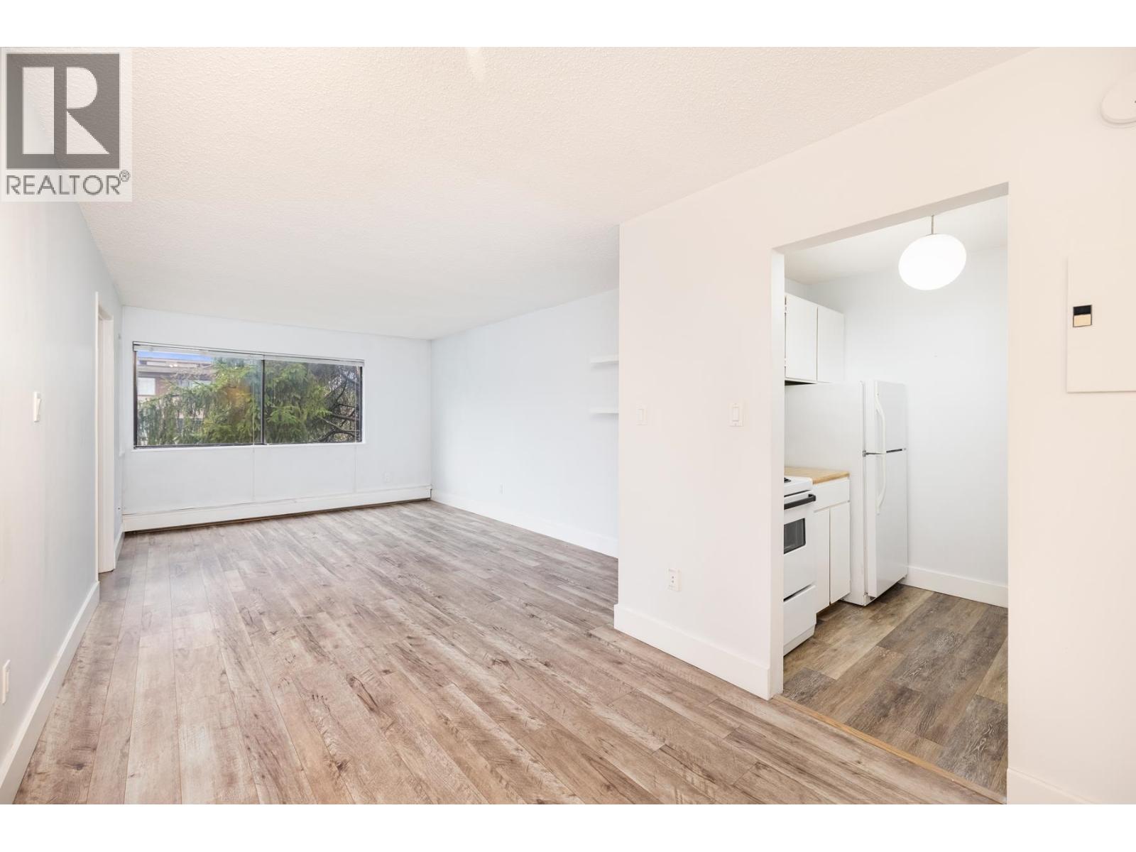 201 830 E 7TH AVENUE