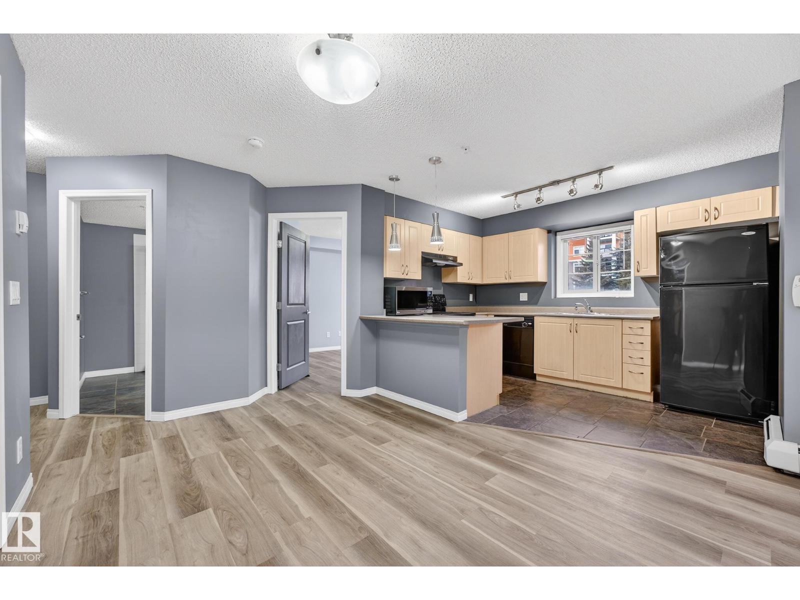 #102 11445 Ellerslie RD SW