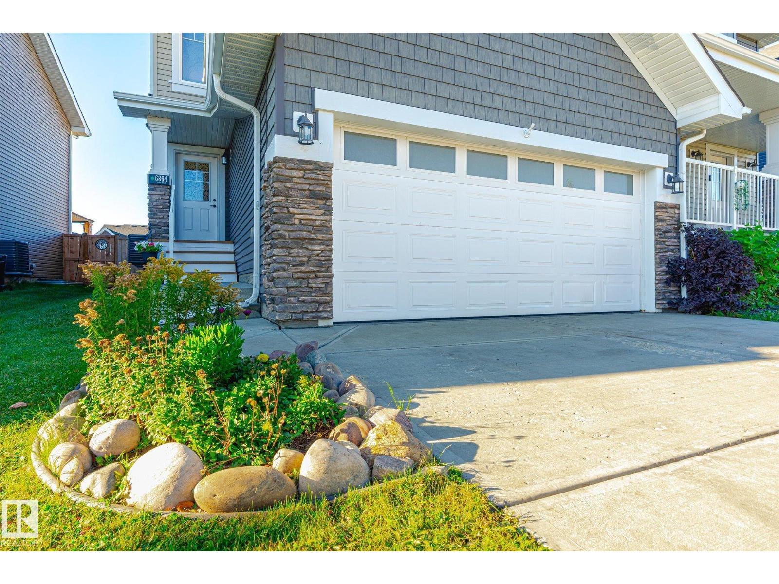 6864 EVANS WD NW