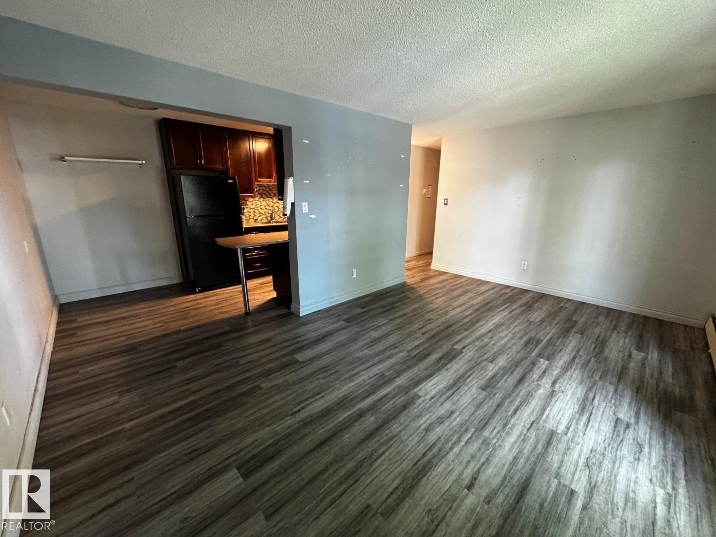 #203 10415 93 ST NW