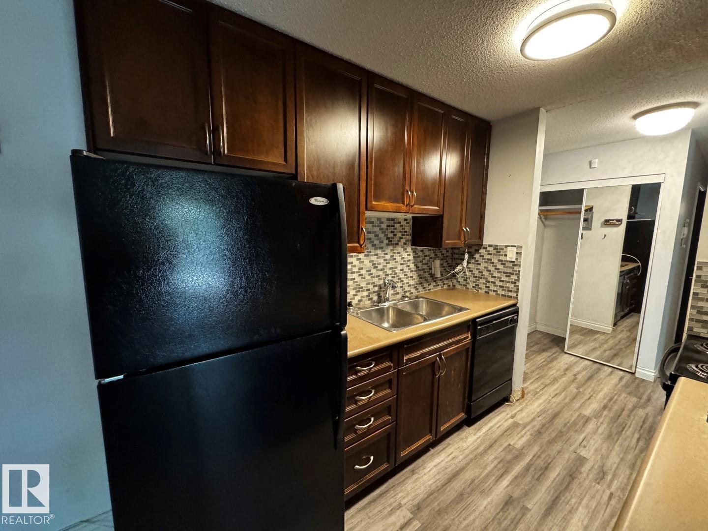 #203 10415 93 ST NW