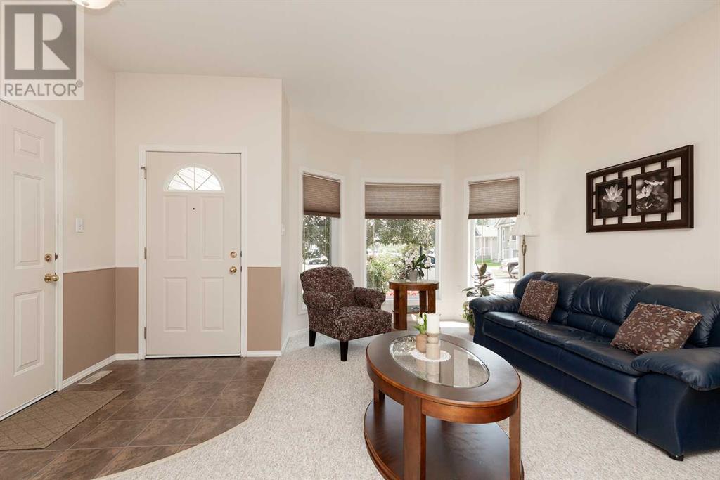 90 Peigan Court W